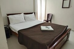 Rooms of FabHotel Nimalan Residency