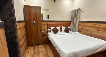 Amma Rooms and Dormitory Room Type - Deluxe Room
