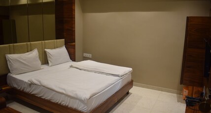 Hotel Pushpa Inn Room Type - Deluxe Non AC Room