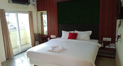 HOTEL LAHARI PURI Room Type - Deluxe King Bed AC Room