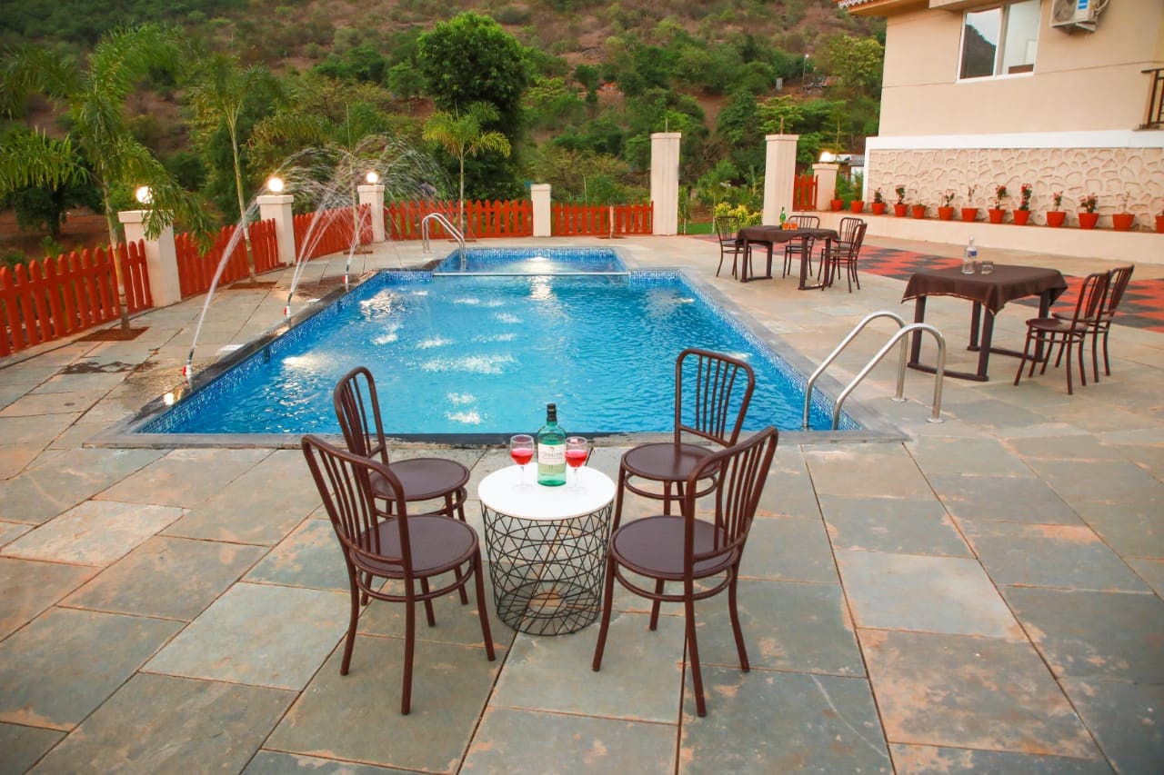 Panchratna 5BHK Villa with Huge Turf, Swimming Pool, and Games - Tap to explore photos