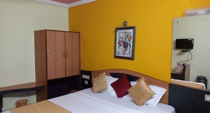 Trimurti Height 500 mtrs from Puri Railway Station Room Type - Deluxe AC Room