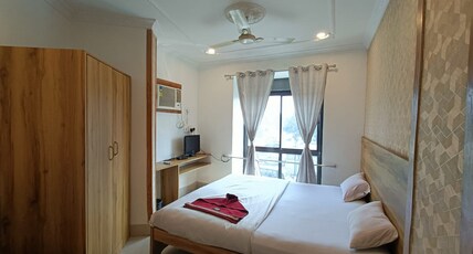 HOTEL PRIYANKA INTERNATIONAL Room Type - Deluxe Room