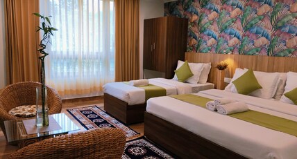 Divine Grace Residency Room Type - Super Deluxe Triple