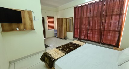 HASHTAG CAFE & STAYS Room Type - DELUXE ROOM 101