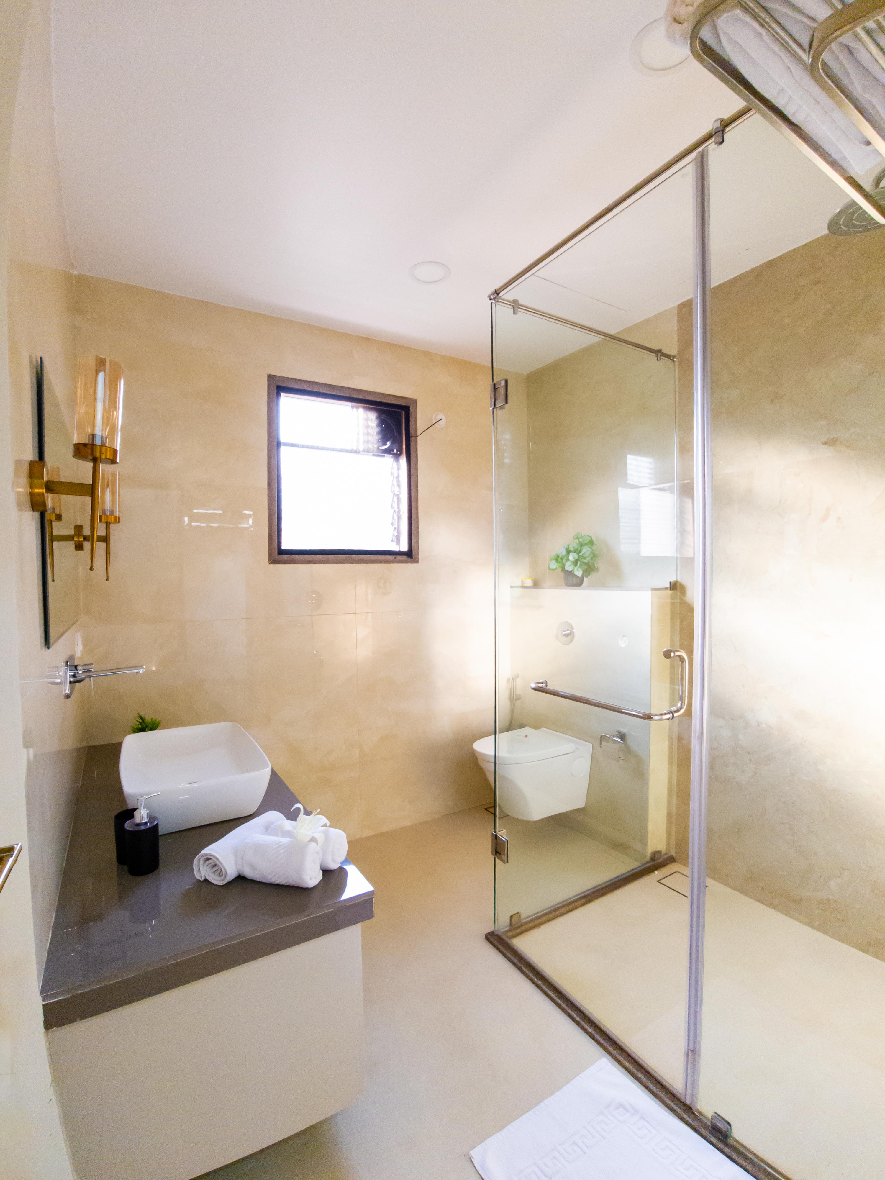 OM Stays 1BHK Adora De Goa Amoret Homes - Tap to explore photos