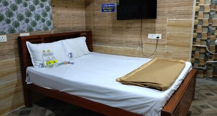 J J RESIDENCY Room Type - Deluxe Room