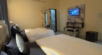BHAGIRATHI RESIDENCY Room Type - Non - AC Triple Bed Room