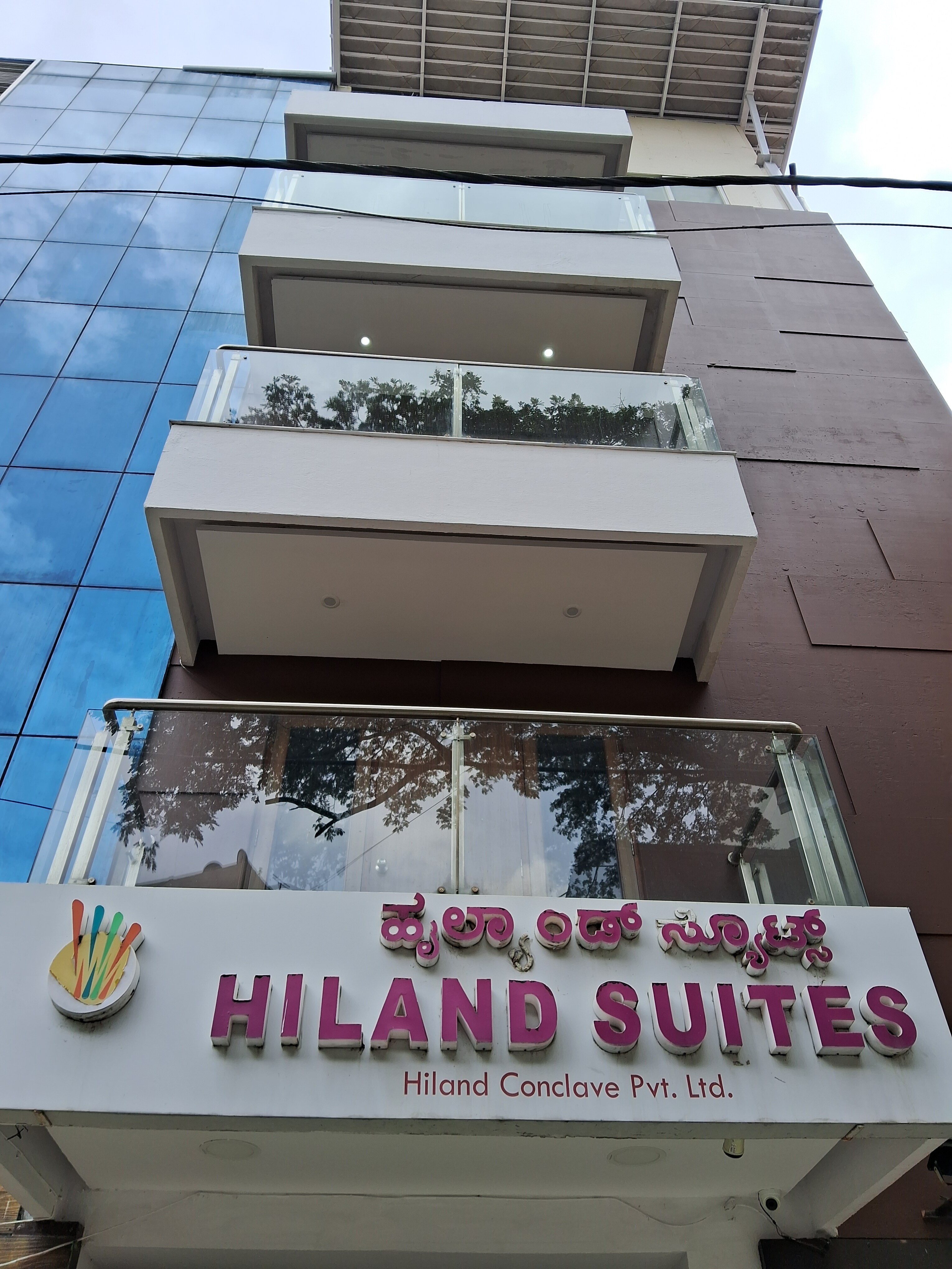 Hiland Suites - Tap to explore photos