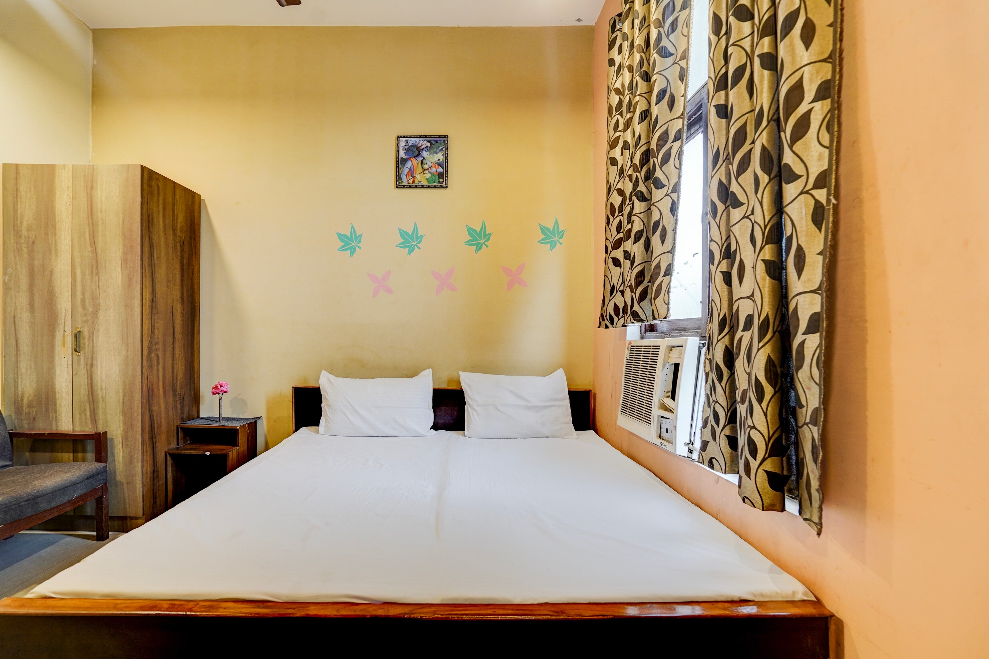 Hotel O by OYO Shyam Utsav - Tap to explore photos