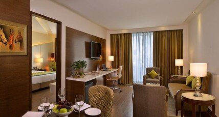 Golden Tulip Hotel Lucknow Room Type - Suite with Living Area, Bathtub and Balcony