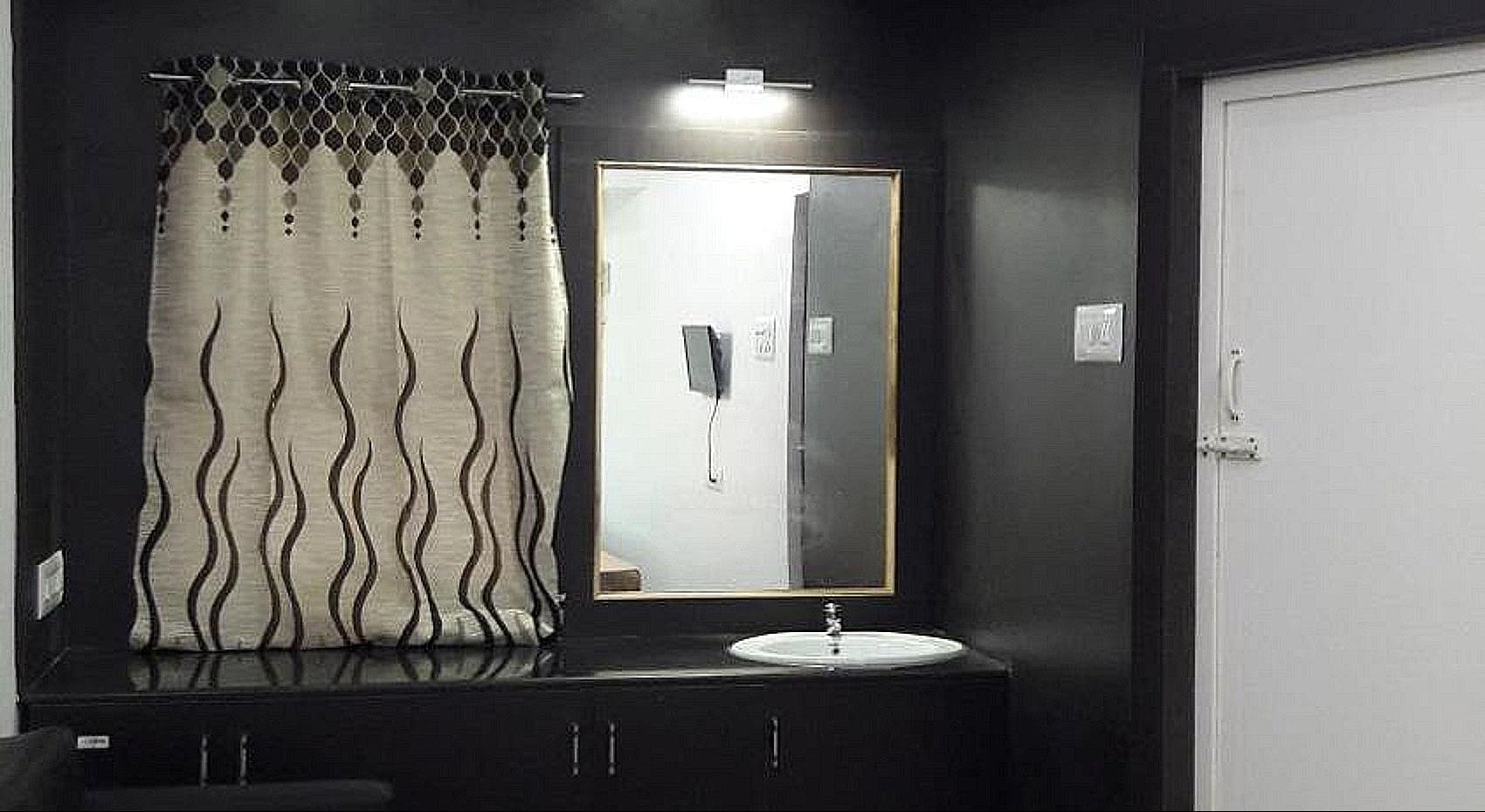 Srirangam Suite Rooms - Tap to explore photos
