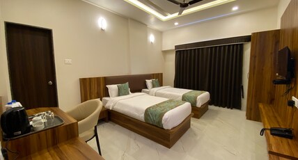 The Grand Sarovar Inn and Suites Room Type - Deluxe Twin Bed Room