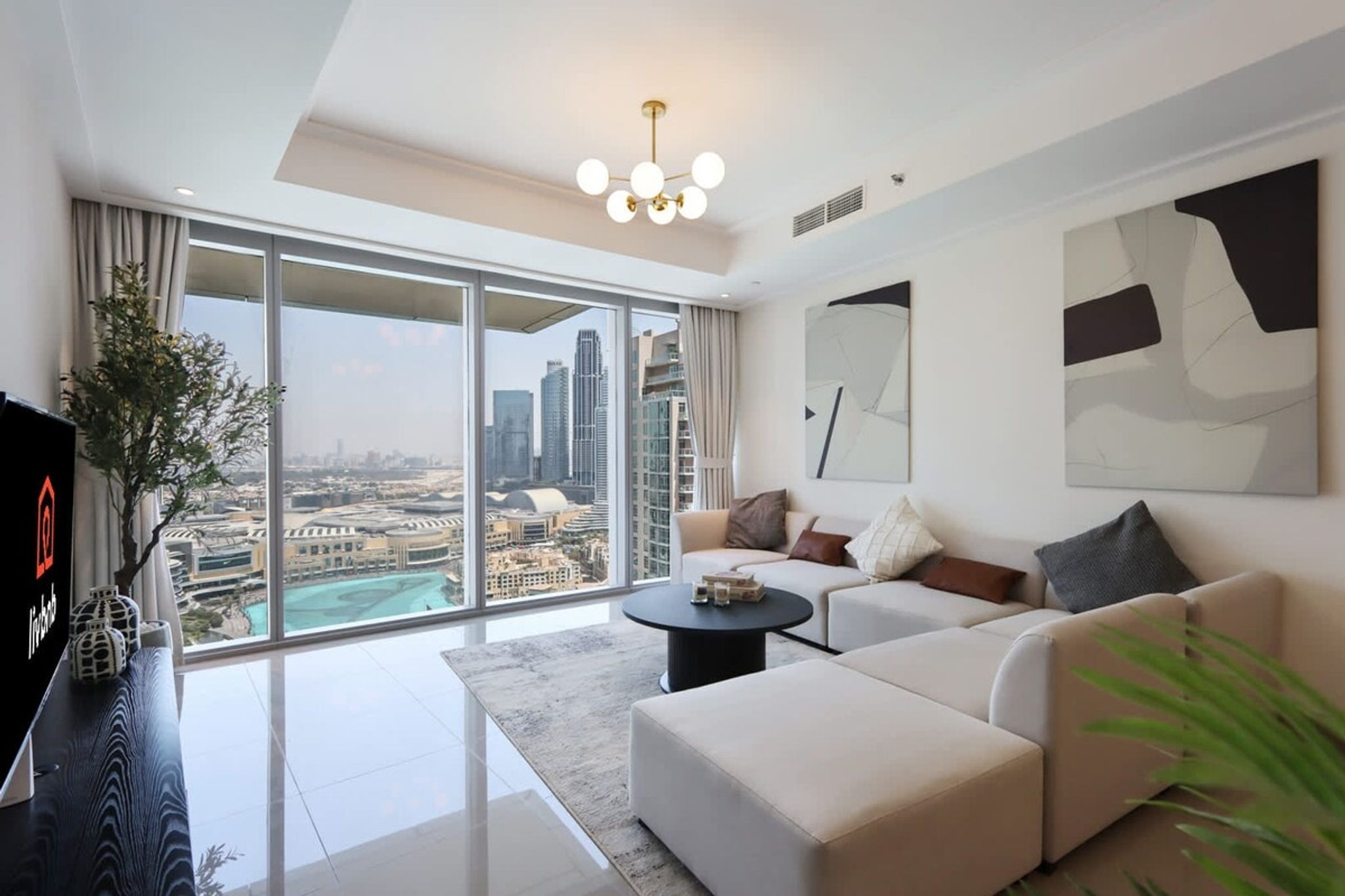 ELIVAAS Curated 2BR with Iconic Burj and Dubai Fountain Views - Tap to explore photos