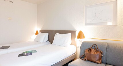 Novotel Grenoble Nord Voreppe Room Type - Standard Room with 1 king size bed or 2 twin beds and 1 single sofa bed