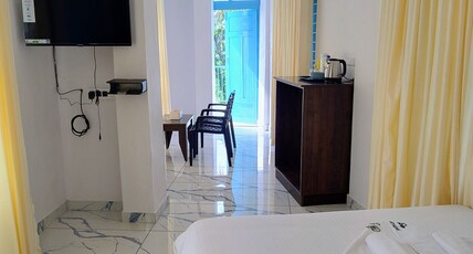 Gulmohar Varkala Room Type - Standard Double Room AC with Balcony