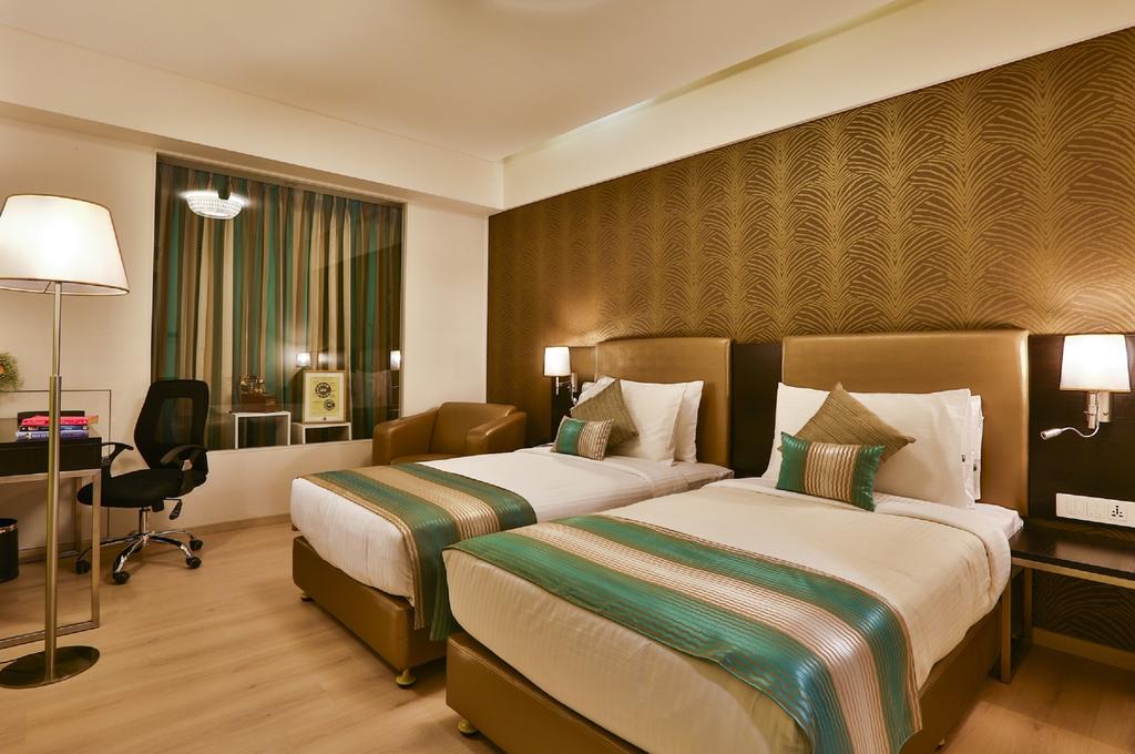 T24 Residency Mumbai International Airport Hotel - Tap to explore photos