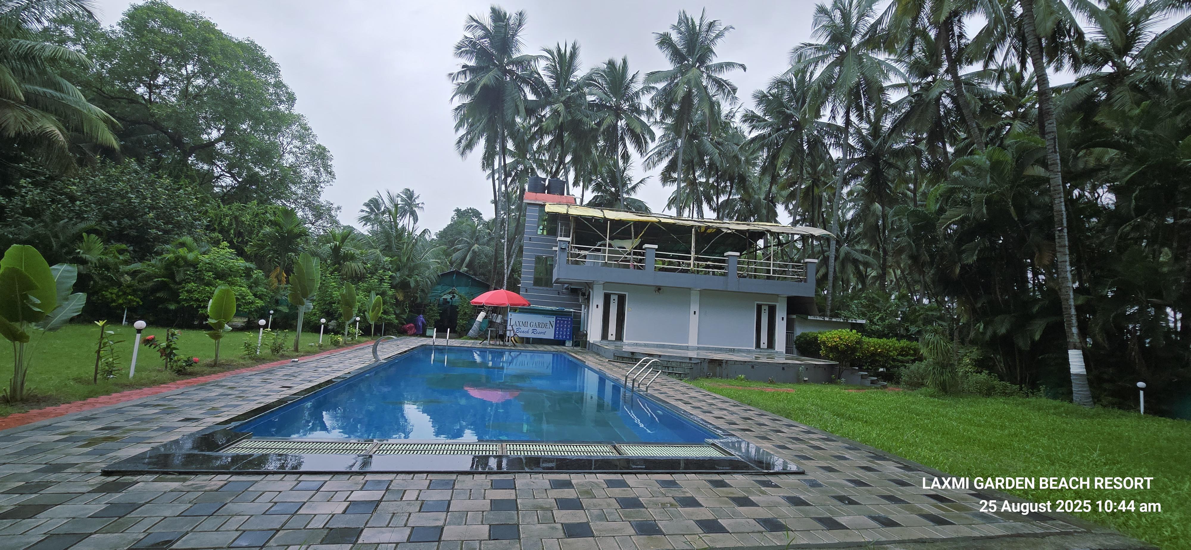 Laxmi Garden Beach Resort | Rooms & Caretaker - Tap to explore photos