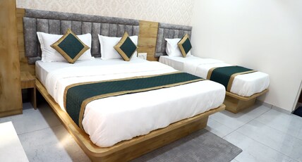 Hotel The Gulmohar Inn Room Type - Family 3 Bed Room Hotel The Gulmohar Inn Room Type - Family 3 Bed Room
