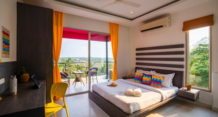 goSTOPS Goa Baga  Room Type - Deluxe Private AC Room with Balcony and Ensuite Bathroom