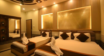 HOTEL ADHUNIK Room Type - Deluxe Triple Room