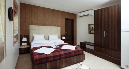 Hotel Ocean Bliss  Room Type - Deluxe Room with Gardan View