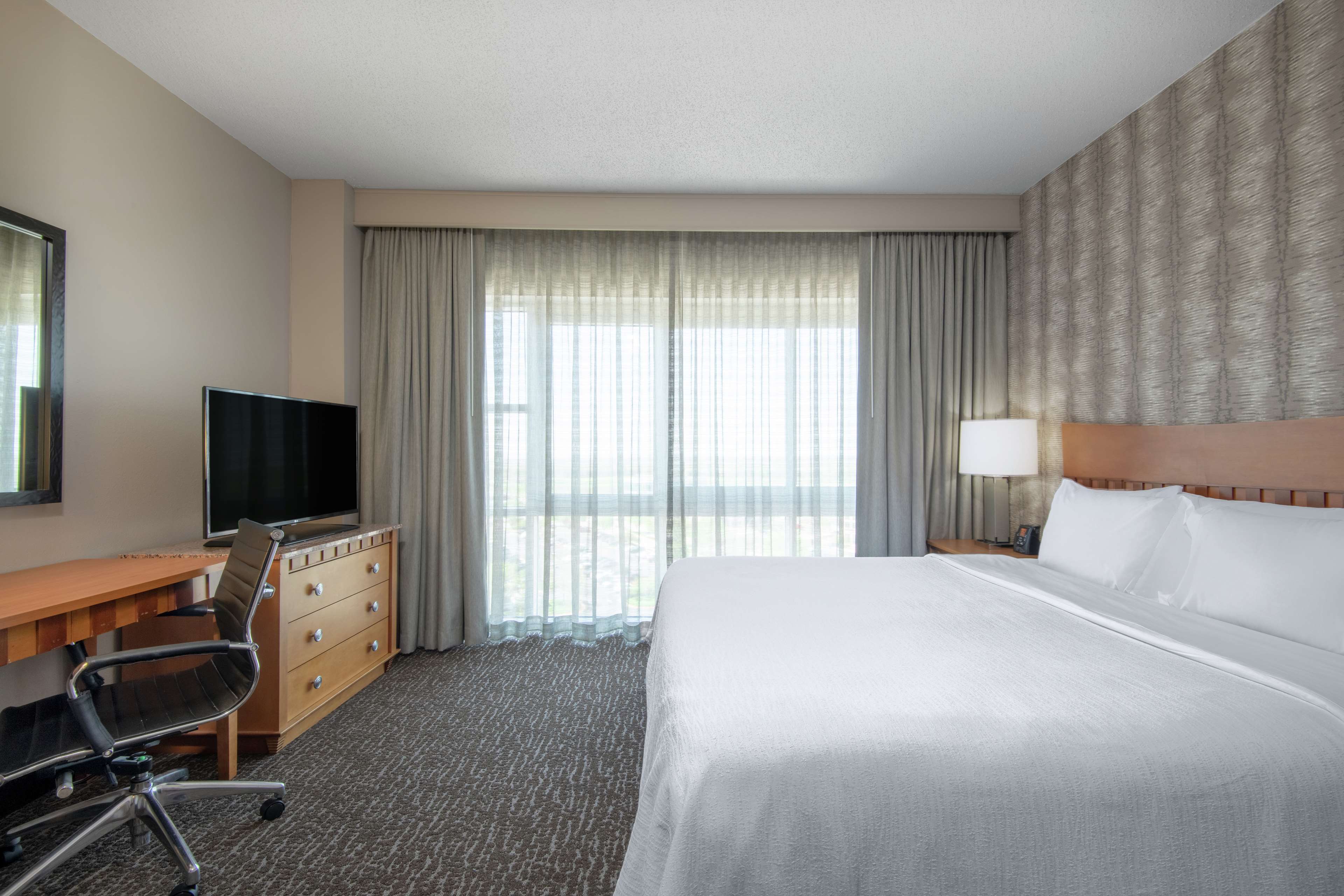 Embassy Suites by Hilton Northwest Arkansas - Tap to explore photos