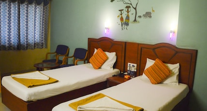 Mallika Residency, near US Consulate. Room Type - DELUXE DOUBLE NON AC Mallika Residency, near US Consulate. Room Type - DELUXE DOUBLE NON AC