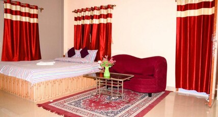 Sinjan Residency Room Type - AC DOUBLE BED SUPER DELUXE