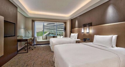 Conrad Manila Room Type - POOL VIEW TWIN DELUXE ROOM