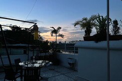 The House Of RK Rooftop patio Jacuzzi