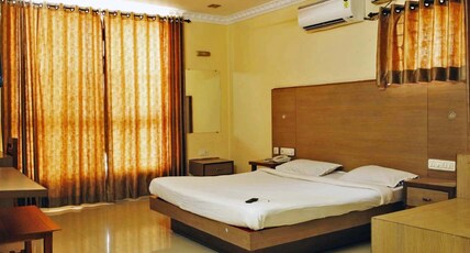 Megha Residency Room Type - Deluxe Double Non AC Megha Residency Room Type - Deluxe Double Non AC
