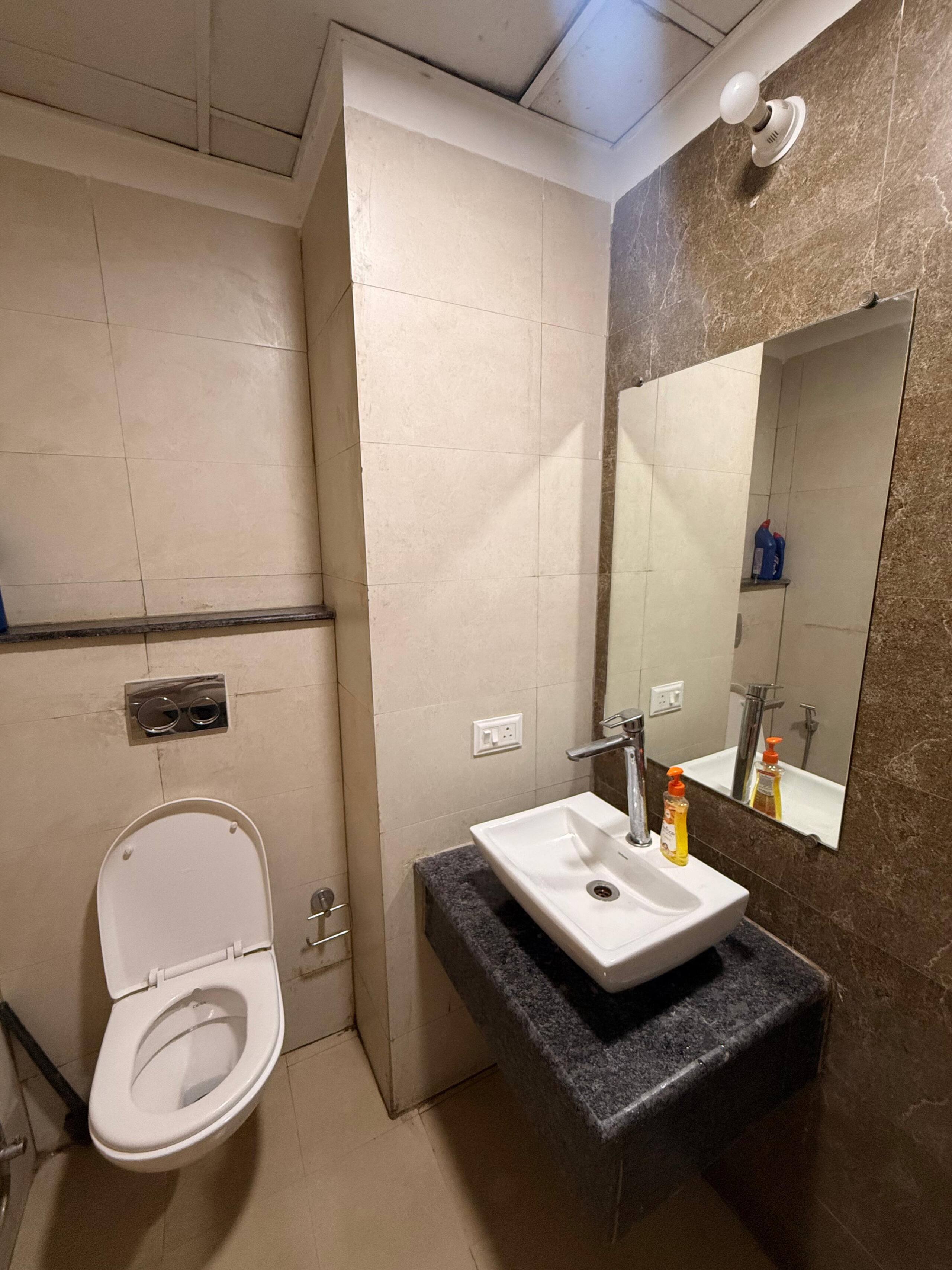 Blissful Perch Modern Studio at Gaur City Center - Tap to explore photos