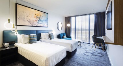 MERCURE CANBERRA BELCONNEN Room Type - Queen and Queen Superior Hotel Room, with bathroom and living space MERCURE CANBERRA BELCONNEN Room Type - Queen and Queen Superior Hotel Room, with bathroom and living space