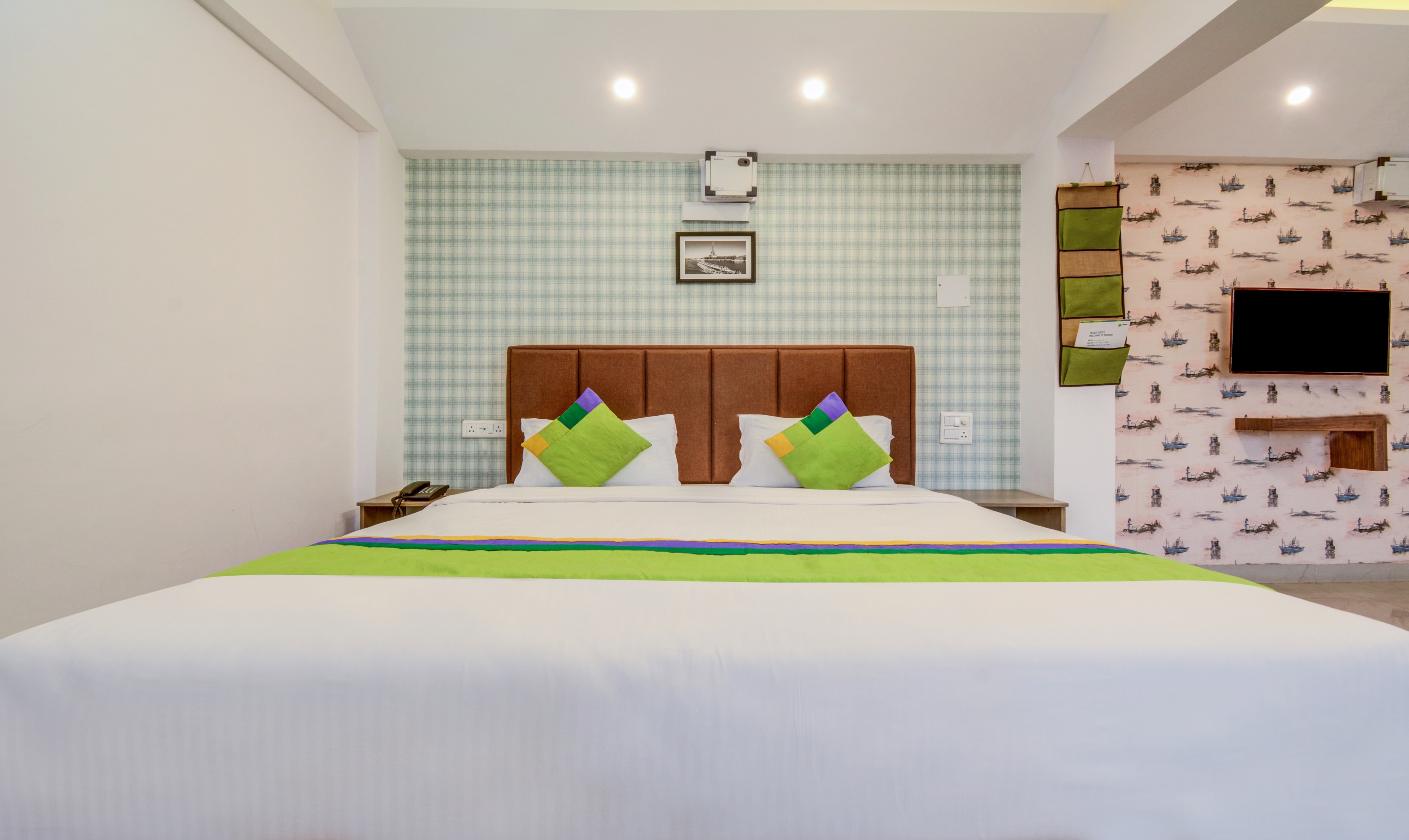 Treebo Iris Suites - Tap to explore photos