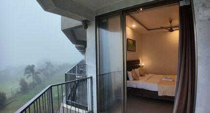 Mountain Breeze Hotel (Pure Veg) Room Type - Family Suite Room with Balcony