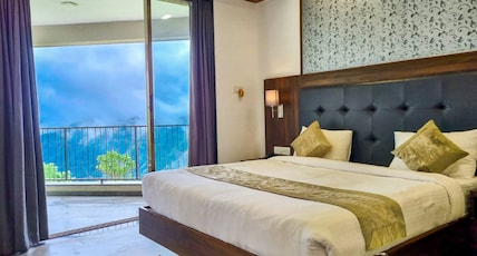 Mountain Breeze Hotel (Pure Veg) Room Type - Highland Valley View (With Balcony) 1st Floor Mountain Breeze Hotel (Pure Veg) Room Type - Highland Valley View (With Balcony) 1st Floor