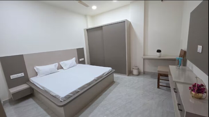 Mahal Heights 2BHK Luxury, Smart TV, Inverter - Tap to explore photos