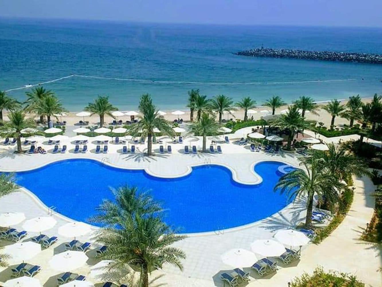 Al Bahar Beach Resort & Hotel Apartments - Tap to explore photos