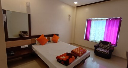 Hotel Vighnaharta Inn Room Type - Delux Room