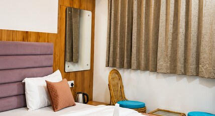 HOTEL MAAYAA INN Room Type - Deluxe Room with Balcony (Ganga View)