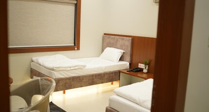 HOTEL SHREE VRINDA Room Type - Deluxe Room with Twins bed