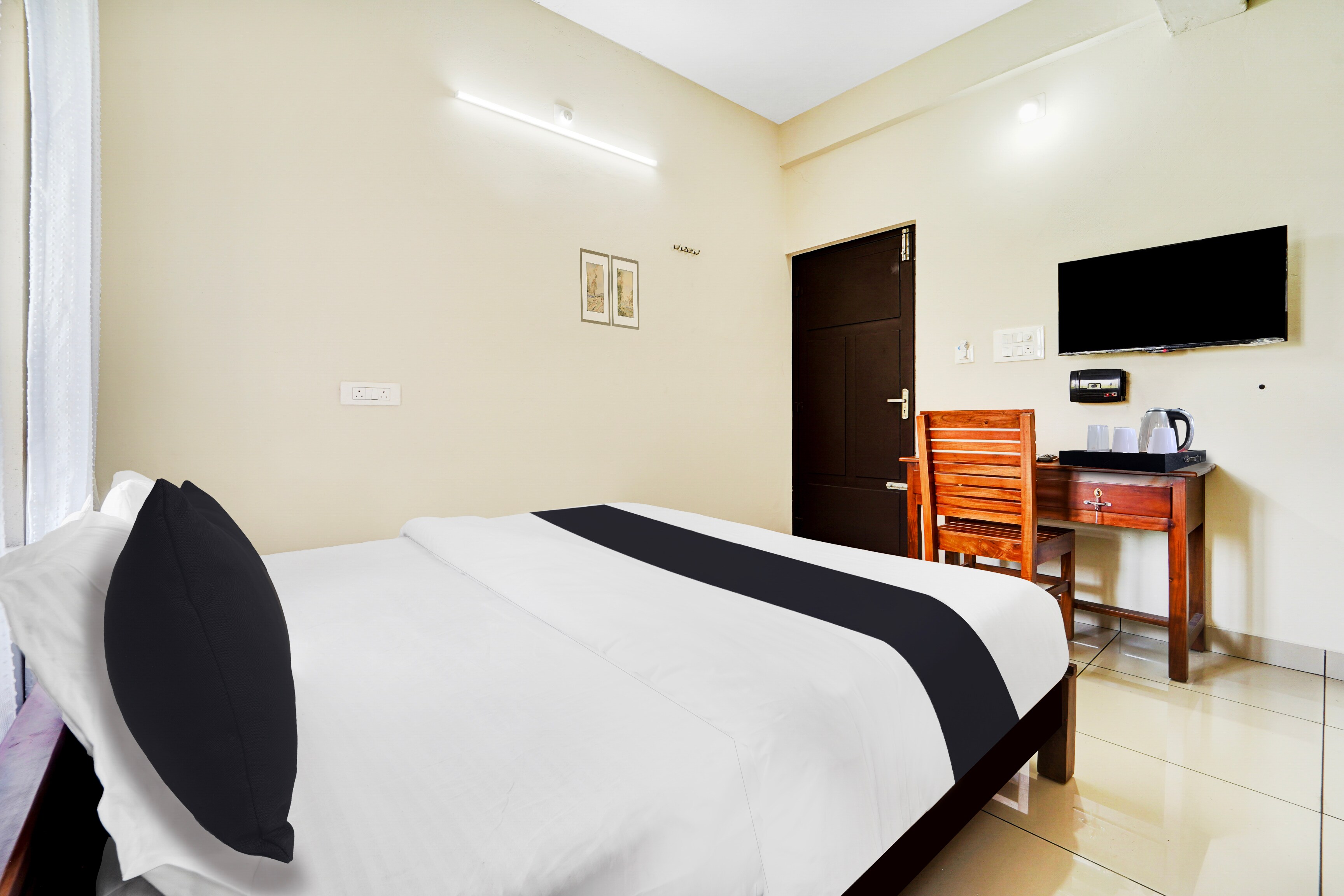 Hotel O Ambalamedu Puthenkurish Road - Tap to explore photos