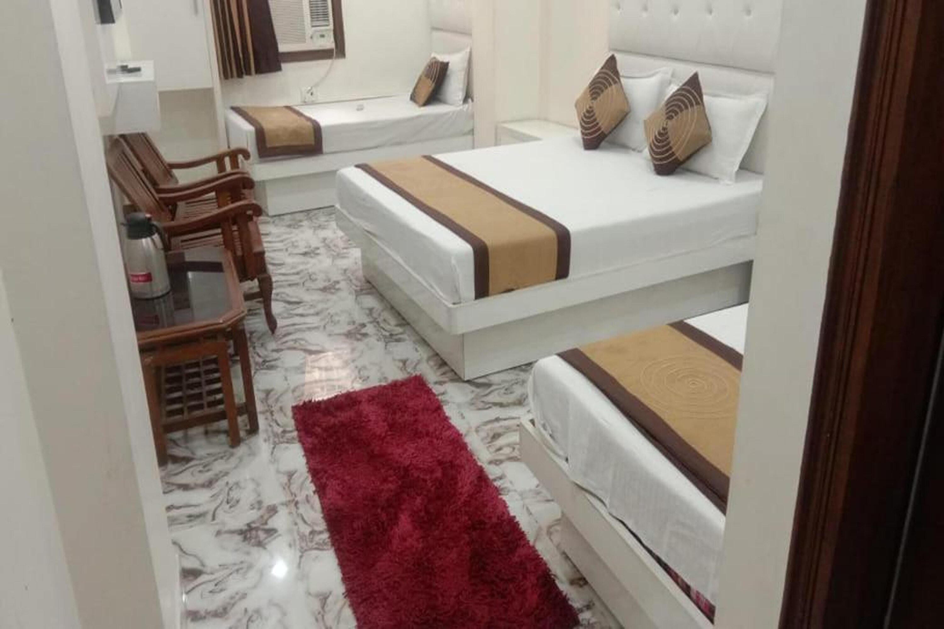 Crystal Deluxe by JMB Hospitality, Paharganj, Delhi - Tap to explore photos