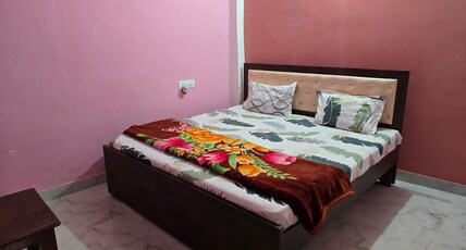 AwadhDham Guest House Room Type - Deluxe Room
