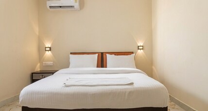 Hotel Vista by Booksy One Kollam | Near Kollam Bypass Room Type - Deluxe room