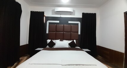 Hotel Home in Paradise !! 5 minutes walk to railway station !! Room Type - Deluxe Room with Highway View