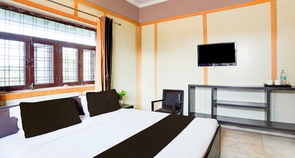 Super Hotel O GMS Road Ballupur Chowk Formerly Maira Residency Room Type - Super Deluxe Room