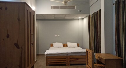 Beach Residency Room Type - Deluxe Family Room with AC