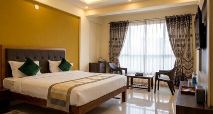 Morjim Pride Hotel with Swimming Pool near Morjim Beach Room Type - Deluxe Room with Garden View